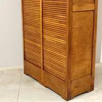 Antique oak filing cabinet with sliding doors