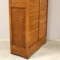 Antique oak filing cabinet with sliding doors