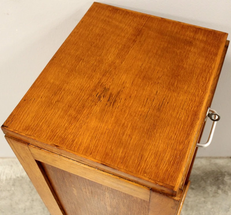 Antique oak filing cabinet with sliding doors