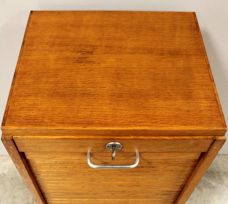 Antique oak filing cabinet with sliding doors