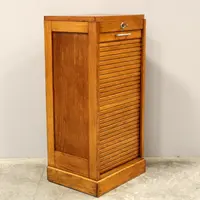 Antique oak filing cabinet with sliding doors