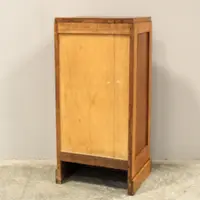 Antique oak filing cabinet with sliding doors