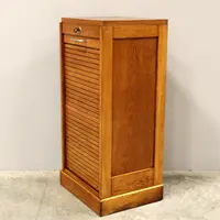Antique oak filing cabinet with sliding doors
