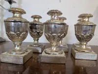 Gruppo di sei porta palme in legno scolpito e argentato