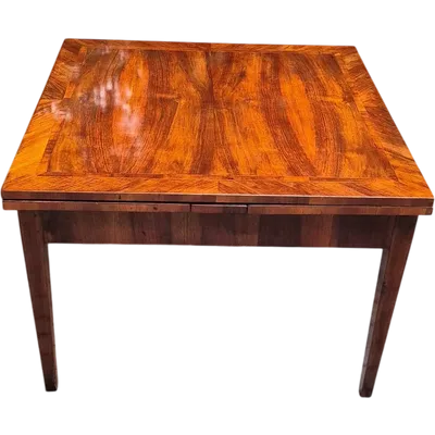 Antique extendable pull-out table with walnut veneer and inlaid trim