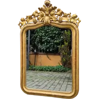 Miroir ancien piémontais doré avec corniche sculptée