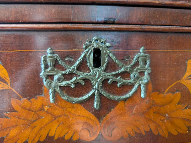 Small Dutch-style domed dresser with floral inlays