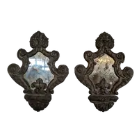 Coppia di specchierine in rame sbalzato e argentato Fine XIX secolo