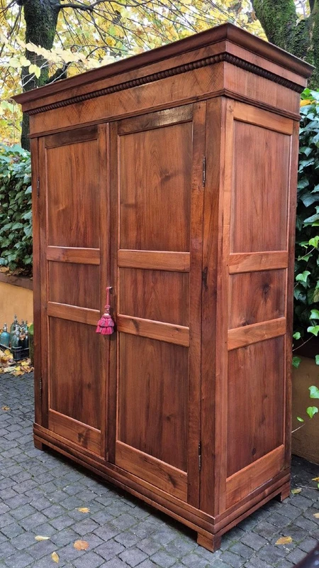 Antique Ligurian walnut paneled cabinet