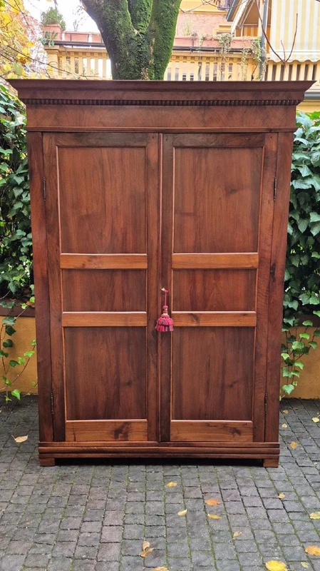 Antique Ligurian walnut paneled cabinet