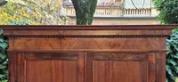Antique Ligurian walnut paneled cabinet