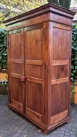 Antique Ligurian walnut paneled cabinet