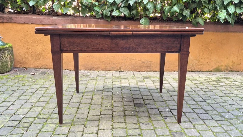 Antique 19th-century pull-out extendable table with spindle legs