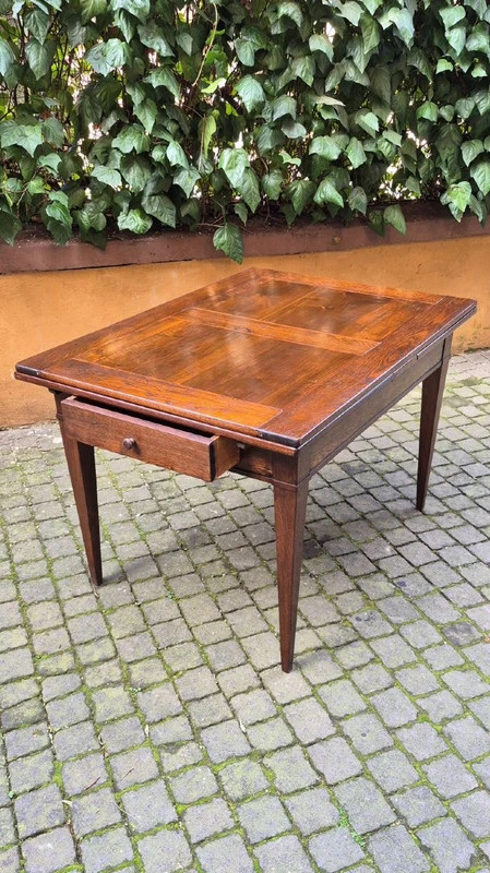 Antique 19th-century pull-out extendable table with spindle legs