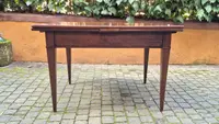 Antique 19th-century pull-out extendable table with spindle legs