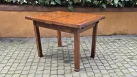 Antique extendable Empire-style table with a filleted tabletop