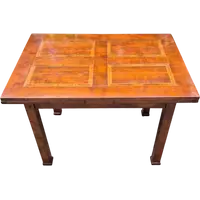 Antique extendable Empire-style table with a filleted tabletop