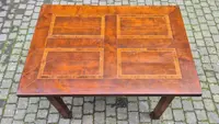 Antique extendable Empire-style table with a filleted tabletop