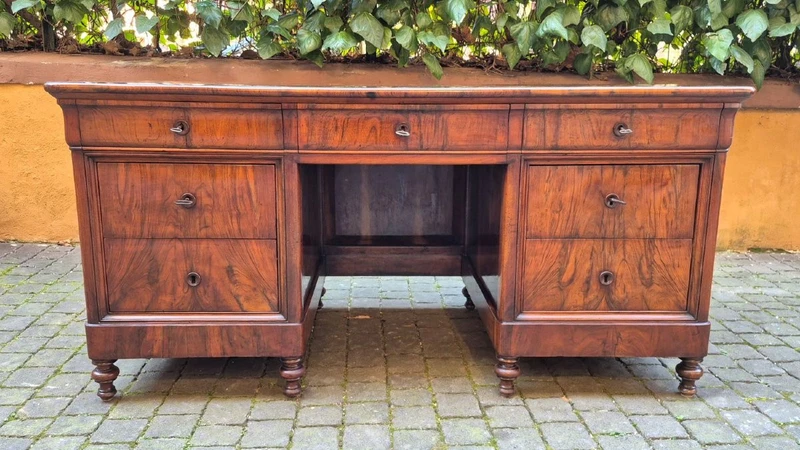 Antique Louis Philippe desk with a walnut and burl veneer and a groove