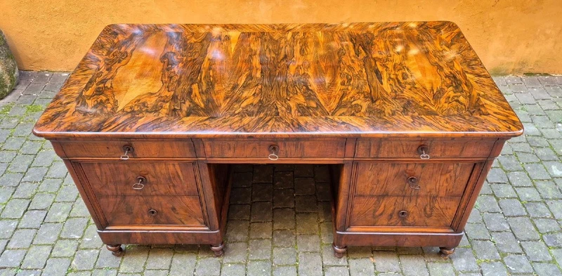 Antique Louis Philippe desk with a walnut and burl veneer and a groove