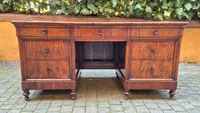 Antique Louis Philippe desk with a walnut and burl veneer and a groove