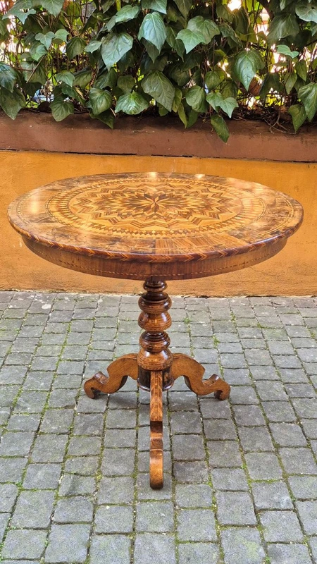 Antique round coffee table by Rolo with inlaid design