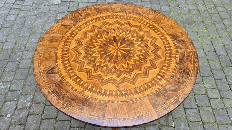 Antique round coffee table by Rolo with inlaid design