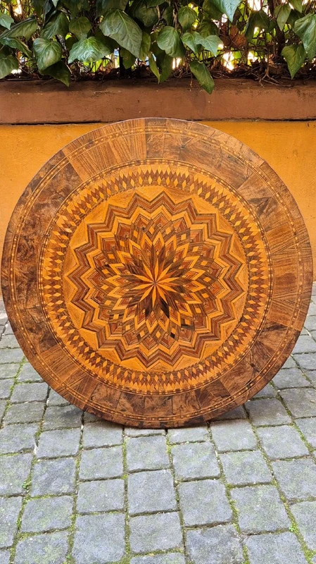 Antique round coffee table by Rolo with inlaid design