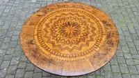 Antique round coffee table by Rolo with inlaid design