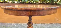 Antique round coffee table by Rolo with inlaid design