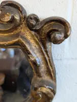 Antica cantagloria in legno scolpito e dorato a mecca