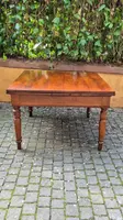 Antique square extendable table with an Emilian-style pull-out mechanism, made of cherry wood