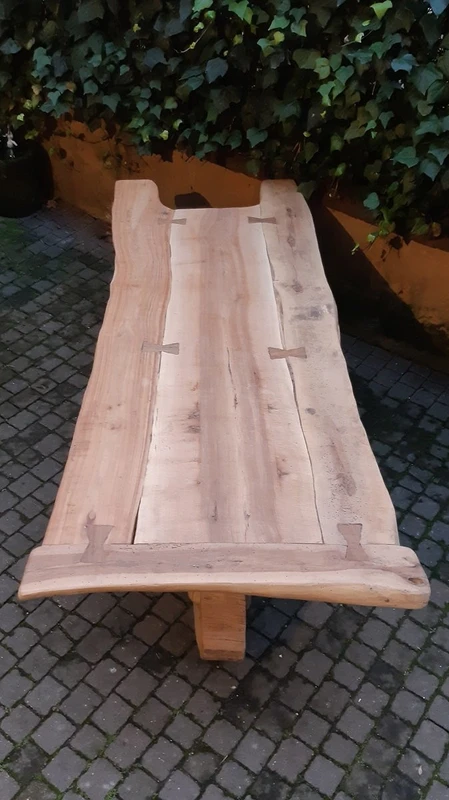 Antique dining table made of walnut, cherry, and oak, from Tuscany