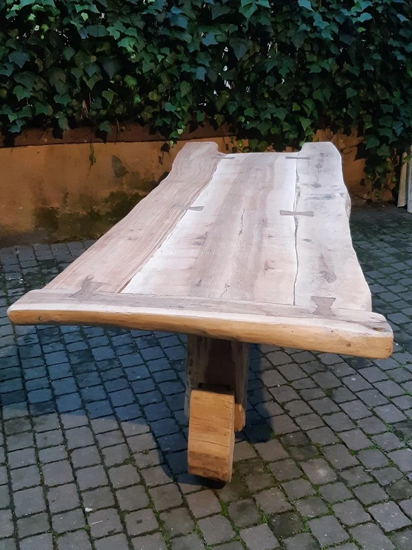 Antique dining table made of walnut, cherry, and oak, from Tuscany