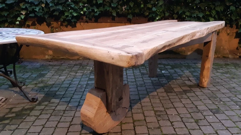 Antique dining table made of walnut, cherry, and oak, from Tuscany