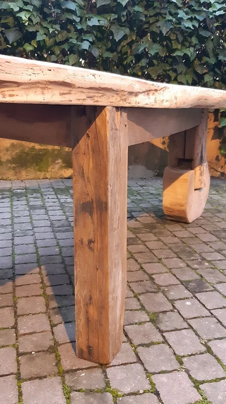 Antique dining table made of walnut, cherry, and oak, from Tuscany