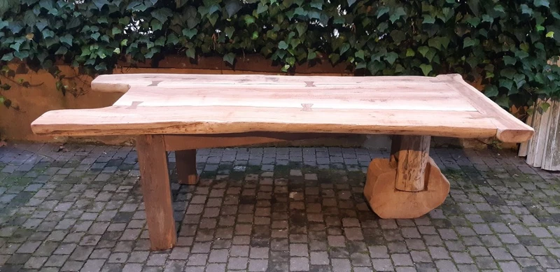 Antique dining table made of walnut, cherry, and oak, from Tuscany