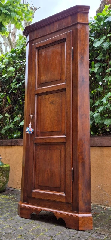Antique Lombard cantonal corner cabinet in walnut