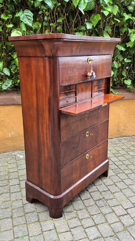 Antique 19th-century chest of drawers with a groove and a drop-down panel