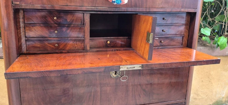 Antique 19th-century chest of drawers with a groove and a drop-down panel