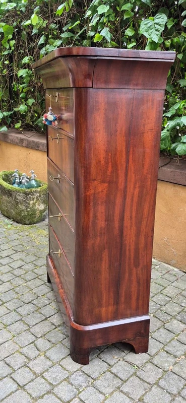 Antique 19th-century chest of drawers with a groove and a drop-down panel