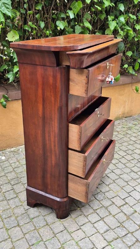 Antique 19th-century chest of drawers with a groove and a drop-down panel