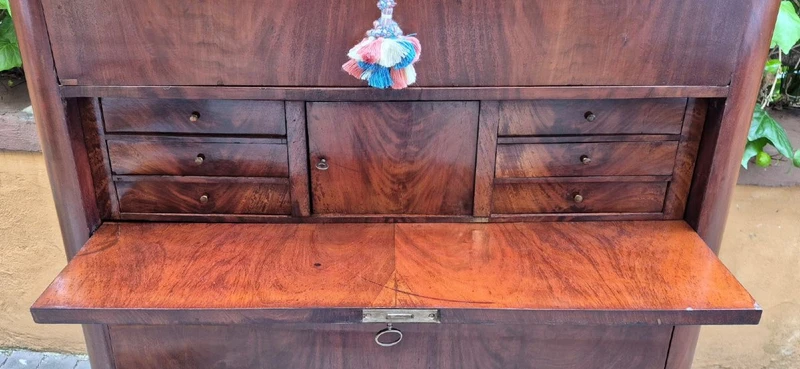 Antique 19th-century chest of drawers with a groove and a drop-down panel