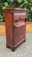 Antique 19th-century chest of drawers with a groove and a drop-down panel