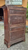 Antique 19th-century chest of drawers with a groove and a drop-down panel