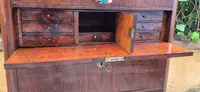 Antique 19th-century chest of drawers with a groove and a drop-down panel
