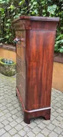 Antique 19th-century chest of drawers with a groove and a drop-down panel