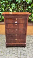 Antique 19th-century chest of drawers with a groove and a drop-down panel