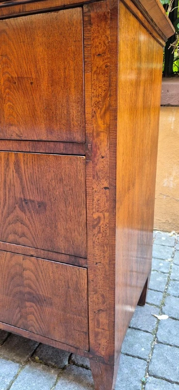 Small antique 19th-century chest of drawers in the Louis XVI style, veneered