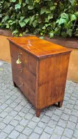 Small antique 19th-century chest of drawers in the Louis XVI style, veneered